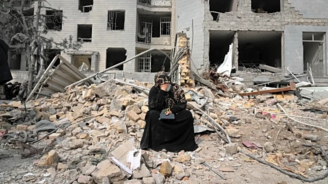 The Latest: Iran escalates attacks as new leader vows to keep fighting