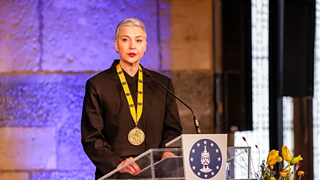 Prominent Belarus opposition figure picks up prize she was awarded while in prison