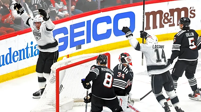 Kings' Kopitar sets franchise points record with 2 goals against Devils