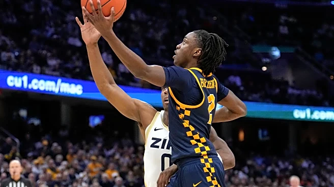 Scott's deep 3-point bomb sends Akron past Toledo, 79-76 for 3rd straight MAC crown