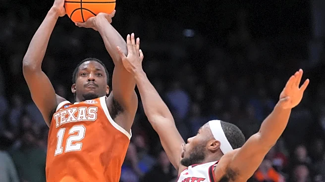Tramon Mark's late jumper gives Texas a 68-66 win over NC State in the First Four