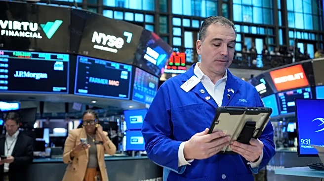 US stocks sink on worries about inflation as gold falls below $5,000 per ounce