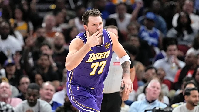Doncic drops 40, James adds 30 as Lakers stretch their streak to 7 with 124-116 win over Rockets