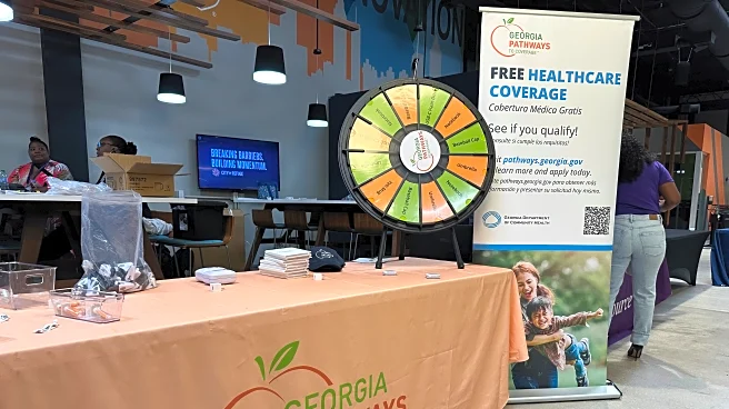 US applications for jobless benefits fall to 205,000 last week as layoffs remain historically low.