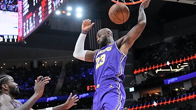 Lakers' LeBron James upgraded to available against Heat, set to tie NBA record for games played
