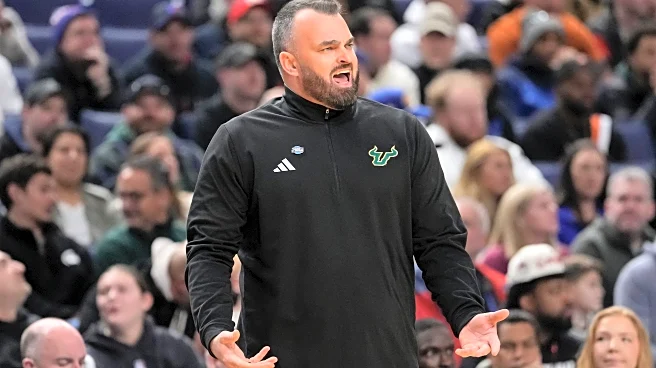 South Florida coach Hodgson's emotions run from tears to touch of anger after NCAA Tournament debut