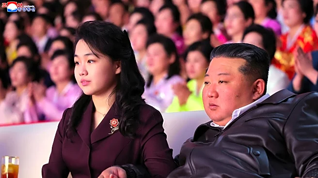North Korean leader Kim and his daughter rides a tank together during army training