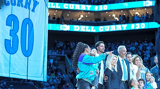 A deserved tribute for Dell Curry, who has his No. 30 jersey raised to the Charlotte rafters