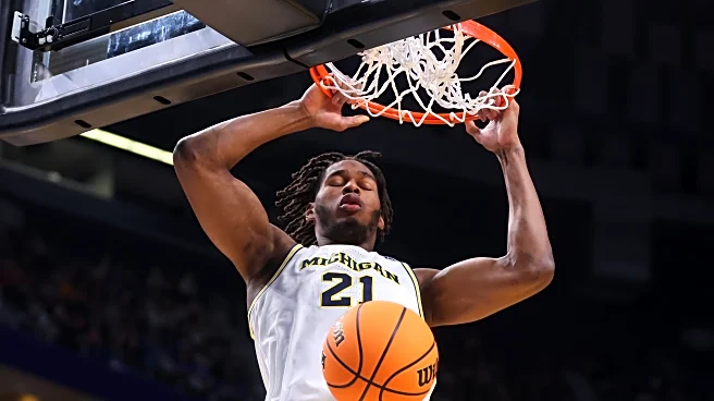 Morez Johnson Jr. and top-seeded Michigan roll past Howard 101-81 in March Madness after slow start