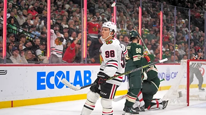 Bedard scores, Blackhawks hang for first win over Wild in seven years