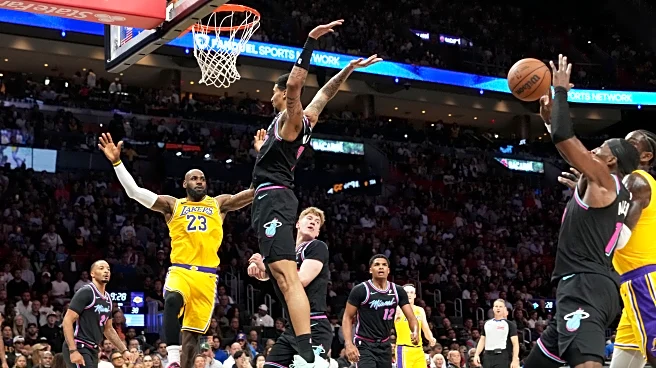 Luka Doncic scores 60, LeBron James ties games-played mark and Lakers top Heat for 8th straight win