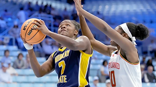 Kyndal Walker scores 20 points to lead Maryland past Murray State 99-67