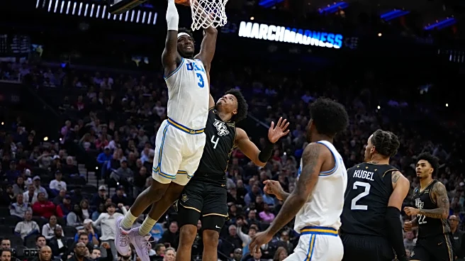 UCLA overcomes broken tooth and stubborn UCF 75-71 to advance in the NCAA Tournament