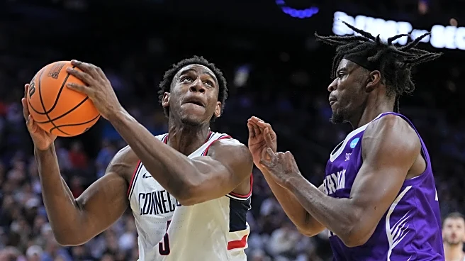 Tarris Reed Jr. has 31 points and 27 rebounds as No. 2 UConn beats Furman 82-71 in NCAA Tournament