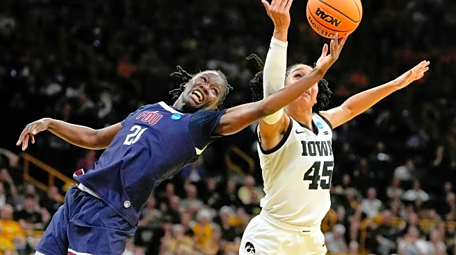 Second-seeded Iowa survives upset bid from No. 15 Fairleigh Dickinson, wins 58-48 in NCAA Tournament