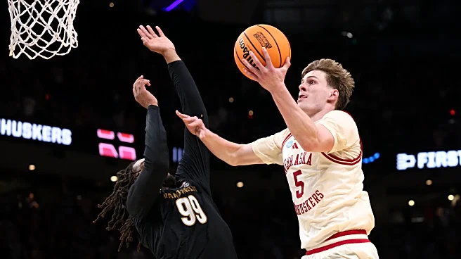 Frager's layup puts Nebraska ahead and Huskers reach Sweet 16 when Tanner's heave rims out for Vandy