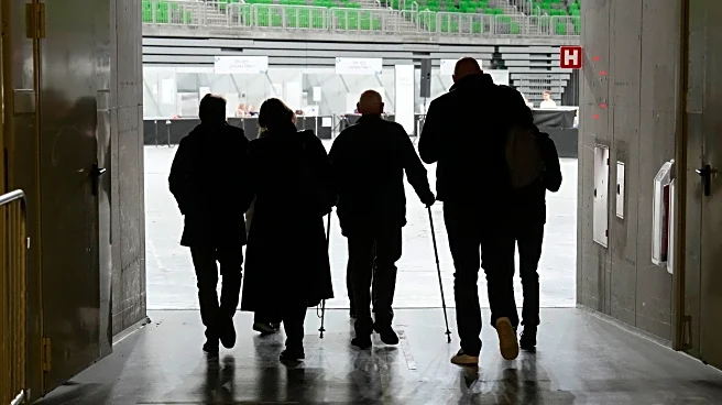 Slovenia's governing liberals face right-wing populists in a tight parliamentary election