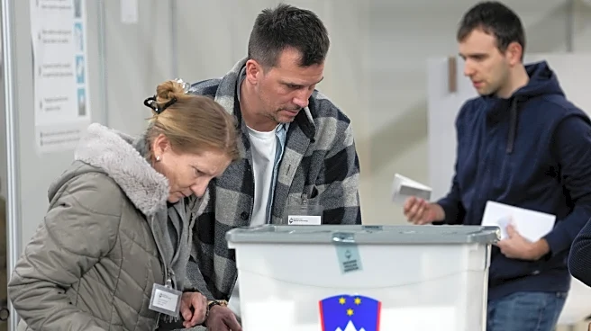Polls close in Slovenia election that is a tight race between liberals and right-wing populists