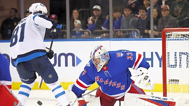 Jets beat the Rangers in a shootout to spoil goalie Dylan Garand's NHL debut