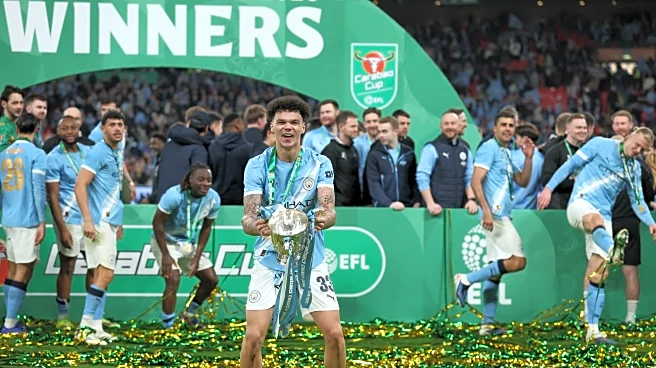Man City dominates Arsenal to win English League Cup and make statement in Premier League title race