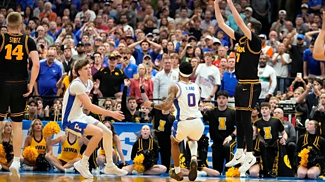 Iowa beats No. 1 seed and defending champ Florida in March Madness on Folgueiras' 3 in final seconds