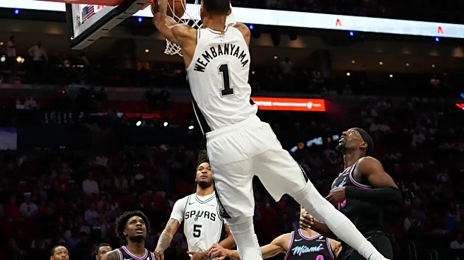 Wembanyama scores 26, red-hot Spurs roll past sliding Heat 136-111 and clinch Southwest Division