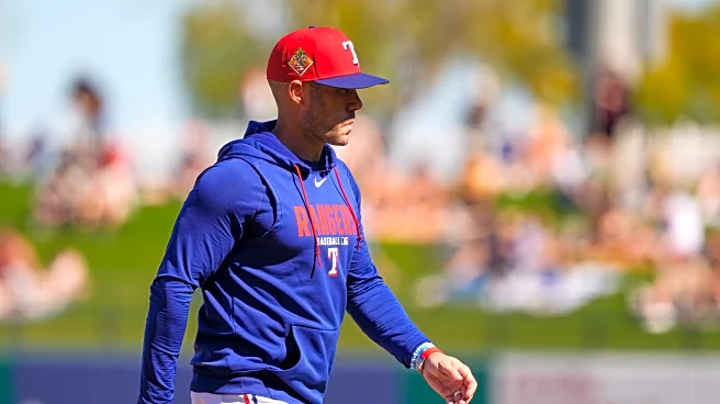 Rangers rookie pitcher finds out he made the team during a mound visit from manager