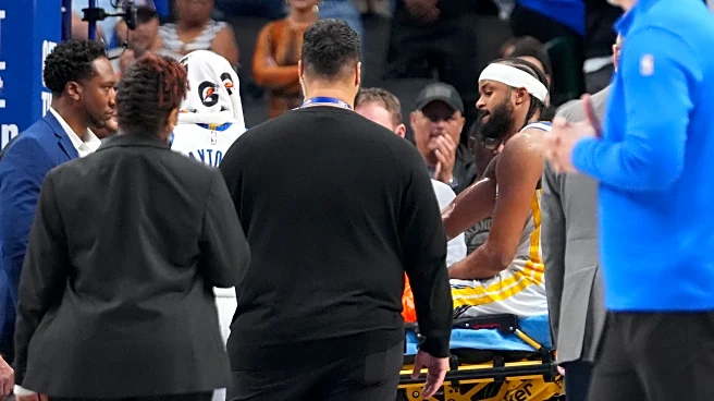 Moses Moody scores 23 before apparently serious injury late as Warriors beat Mavs 137-131 in OT