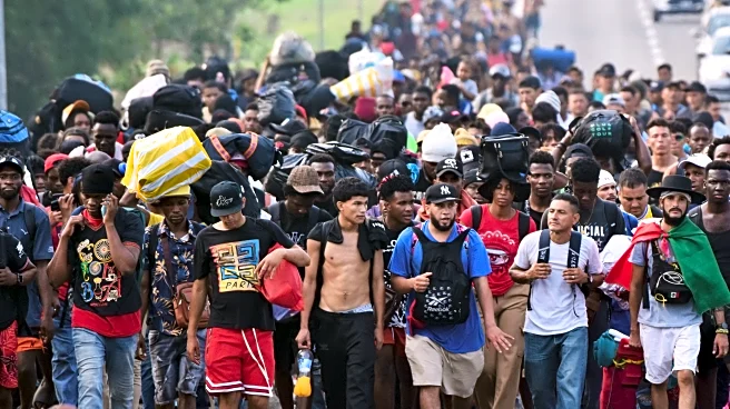 Migrants march from southern Mexico, protesting delays and seeking papers to work