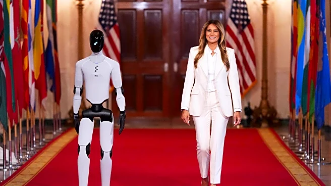 Melania Trump shares the spotlight with a robot at an education and technology event