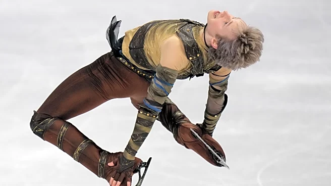 Malinin rebounds from Olympics at the worlds with a personal-best short program