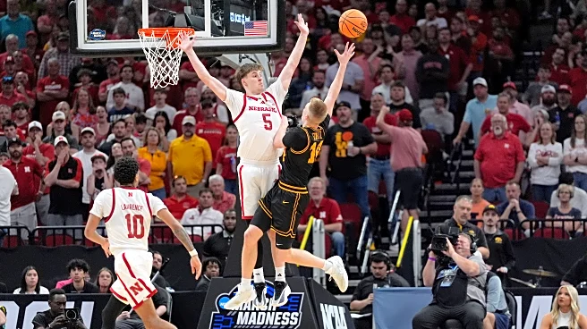 Ninth-seeded Iowa continues improbable March run, beating Nebraska 77-71 to reach Sweet 16