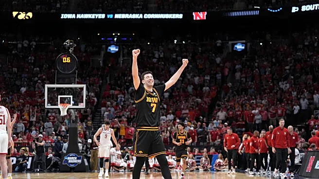 Ninth-seeded Iowa continues improbable March run, beating Nebraska 77-71 to reach Elite Eight