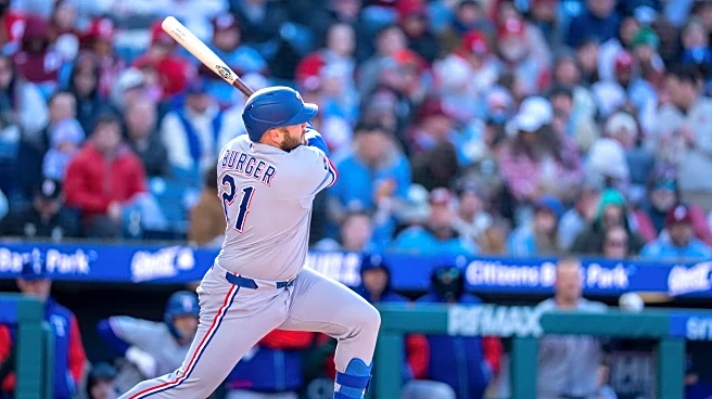 Rangers blow 3-run lead in 9th inning but recover to top Phillies 5-4 in the 10th