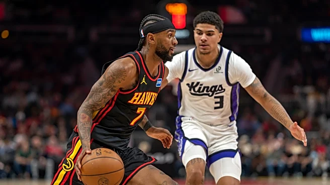 Hawks withstand fourth-quarter surge by Kings in 123-113 victory as Snyder gets 500th win