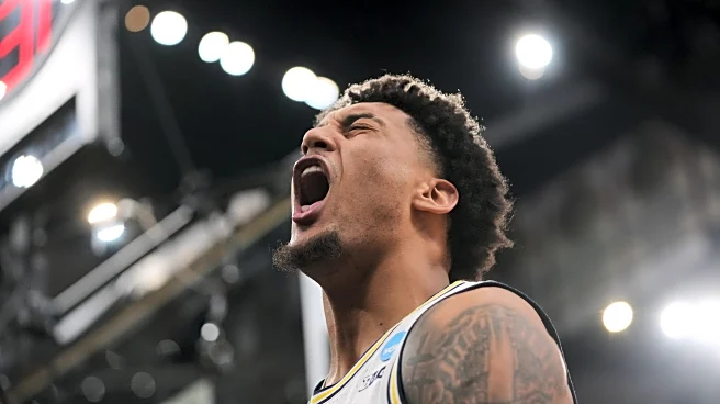 Yaxel Lendeborg scores 27 points as Michigan rolls into the Final Four, beating Tennessee 95-62