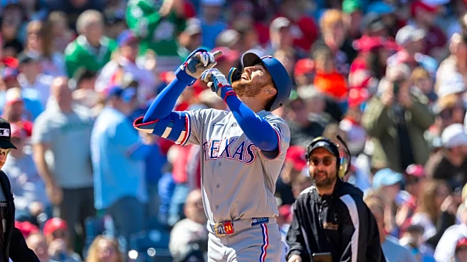 Gore wins 1st start, Nimmo and McCutchen hit 1st homers for Rangers in blowout of Phillies
