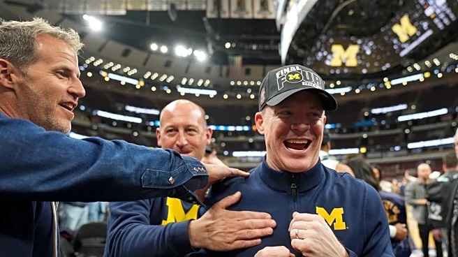 Michigan coach Dusty May leads the Wolverines into the program's first Final Four since 2018