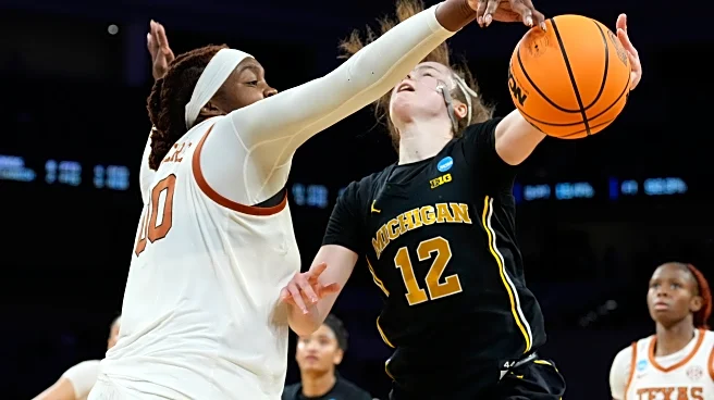 Misfiring Michigan wilts under Texas defense's pressure in 77-41 Elite Eight loss