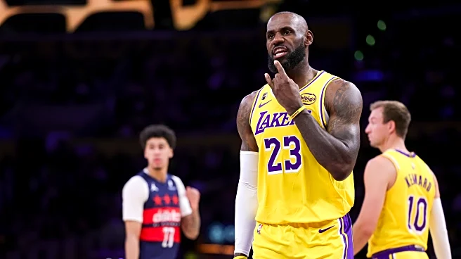 With Luka Doncic suspended, LeBron James' triple-double powers Lakers to 120-101 win over Wizards