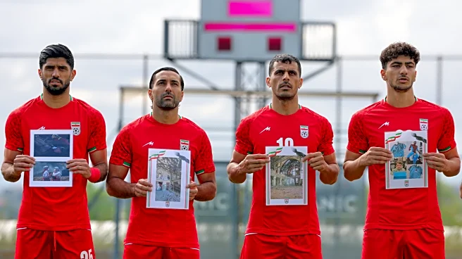 Iran soccer players meet FIFA head Infantino before World Cup warmup and honor child victims of war