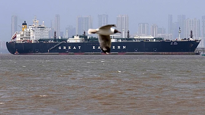 Iran hits Kuwait airport and a tanker off Qatar while strikes batter Tehran ahead of Trump speech