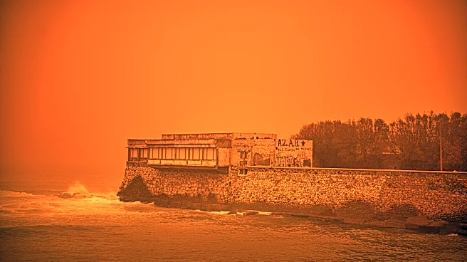 Saharan dust storm turns Greek sky red as winds and flooding leave 1 person dead