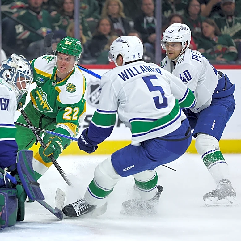 Wild wrap up a playoff spot with 5-2 victory over the Canucks