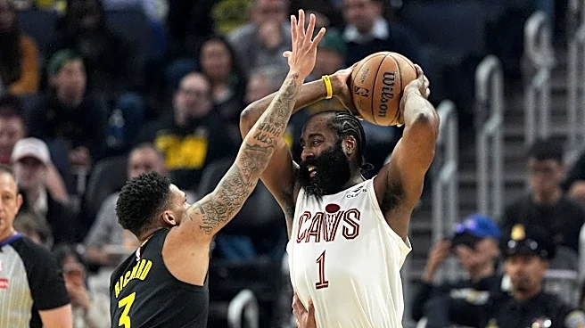 Donovan Mitchell scores 25, Max Strus 24 as Cavaliers hold off Warriors 118-111
