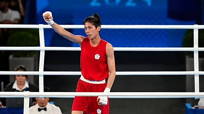 Olympic gold medalist boxer at center of gender controversy advances to Asian semifinals