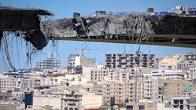 Iran fires on targets across the Mideast while Israel and US hit Tehran as war nears end of 5th week