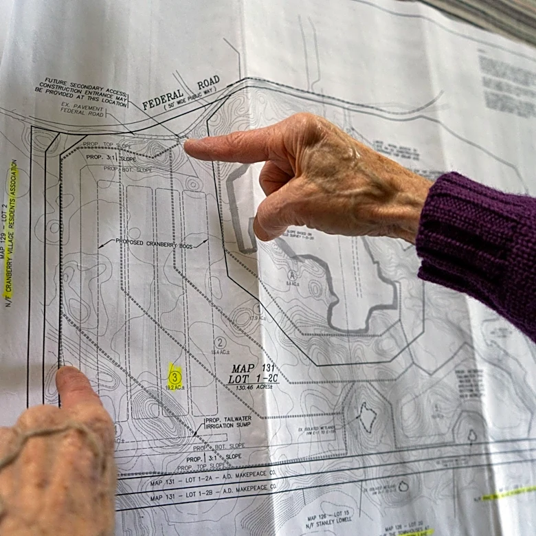 As waterfront homeowners stock up on sand, those living near sand excavation sites pay the price