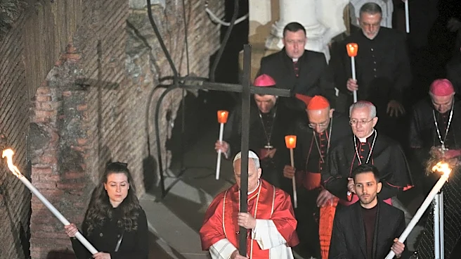 Pope Leo XIV carries cross for full Good Friday procession, the first pontiff to do so in decades