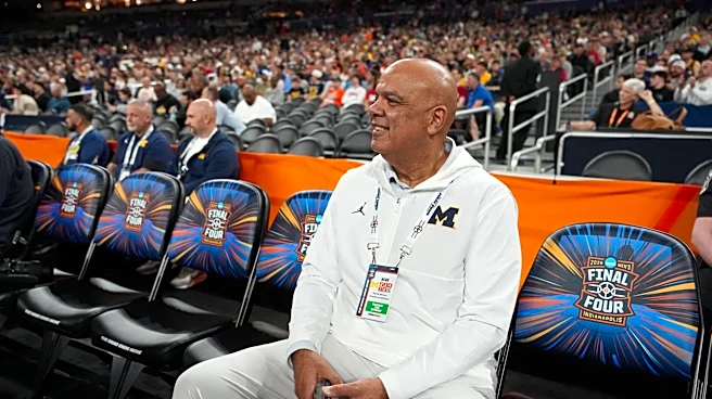 Michigan rolls in hoops and hockey but a football scandal leaves the athletic director on thin ice